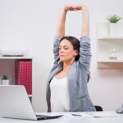 Stretches To Do While Sitting at Your Desk (And Staying Seated!)