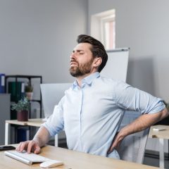 12 Office Stretches for Back Pain to Do Midday
